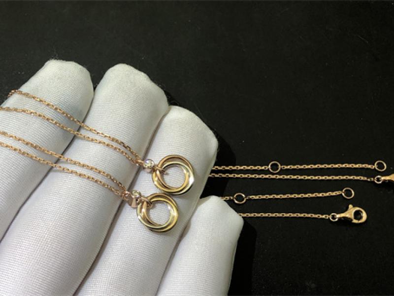 TRINITY pendant set with round brilliant cut diamonds in 18K white gold, 18K yellow gold, and 18K rose gold