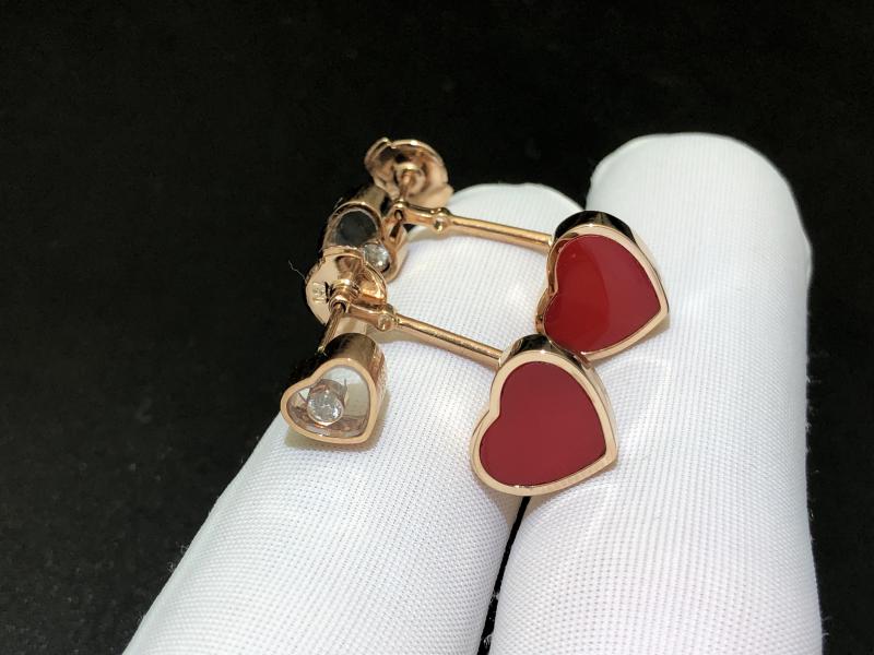 Earrings, rose gold, diamonds, red gemstones
