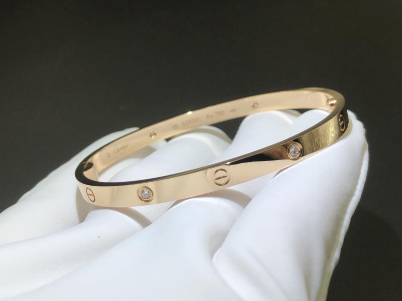 LOVE bracelet, medium size, set with 4 diamonds, 18K rose gold