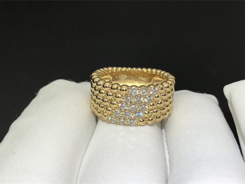 Perl é e diamonds ring with 5 rows of diamond studded design